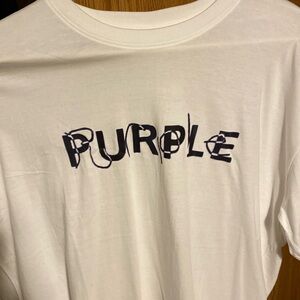 Brand new all white purple brand shirt with brand writing in two different texts